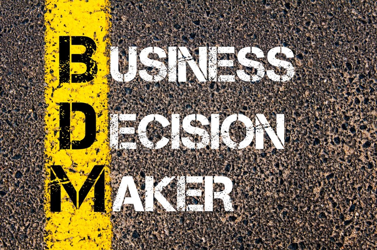 Concept image of Business Acronym BDM Business Decision Maker written over road marking yellow paint line